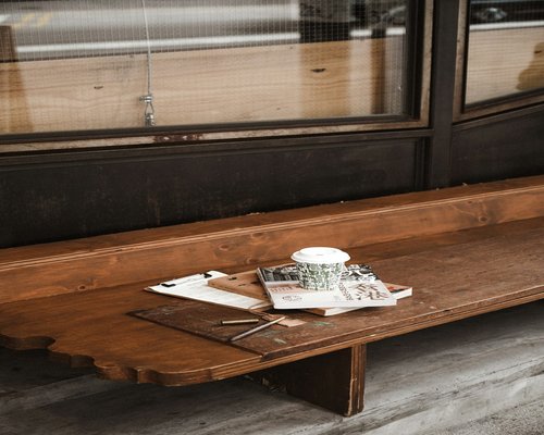 cozy coffee shop table with notebook light styling
